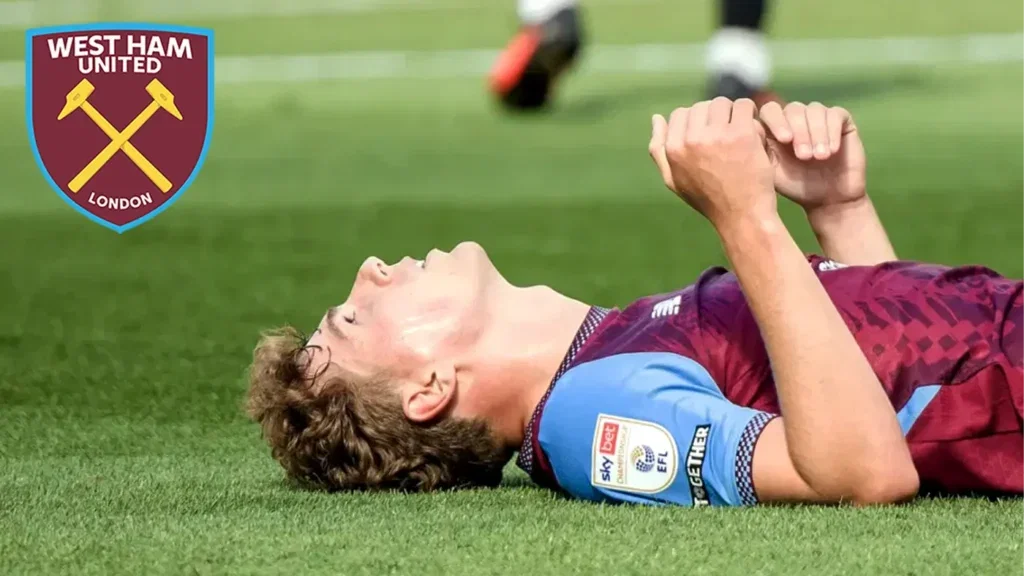 Arne Engels falls to the floor after struggling on his Championship debut