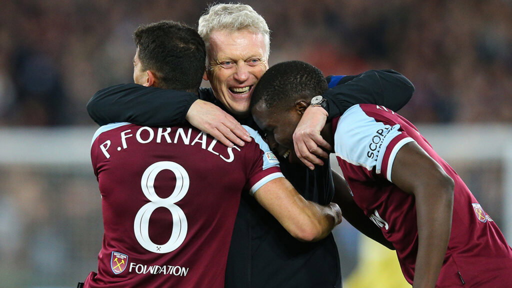 West Ham manager David Moyes embraces Pablo Fornals and Kurt Zouma