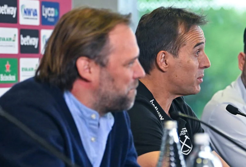 Tim Steidten grimaces as he sits alongside Julen Lopetegui at a West Ham Press conference