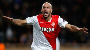 Monaco's Tunisian defender Aymen Abdennour celebrates after scoring a goal during the UEFA Champions League football match AS Monaco (ASM) vs Zenit Saint-Petersburg, on December 9, 2014 at the Louis II stadium in Monaco. AFP PHOTO / VALERY HACHE        (Photo credit should read VALERY HACHE/AFP/Getty Images)