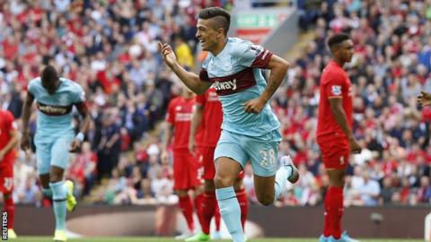 Lanzini celebrates after scoring AGAINST Liverpool