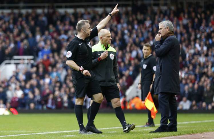 Football - West Ham United v Chelsea - Barclays Premier League - Upton Park - 24/10/15  Chelsea manager Jose Mourinho looks on as Referee Jonathan Moss send to the stands goalkeeping Christophe Lollichon and assistant first team coach Silvino Louro (not pictured)  Reuters / Eddie Keogh  Livepic  EDITORIAL USE ONLY. No use with unauthorized audio, video, data, fixture lists, club/league logos or "live" services. Online in-match use limited to 45 images, no video emulation. No use in betting, games or single club/league/player publications.  Please contact your account representative for further details.
